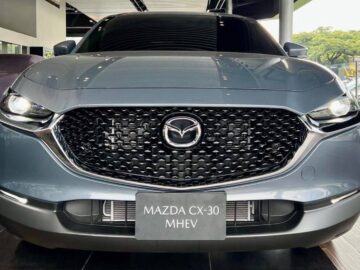 Mazda CX-30 (DM)(በባትሪ ኤሌክትሪክ ሙሌት የሚሰራ 265 ኪሜ በአንድ ሙሌት) is a subcompact crossover SUV 2022