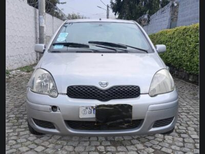 Image 1 (Front Exterior View): Silver 2002 Toyota Vitz XP10 hatchback front view parked in Addis Ababa