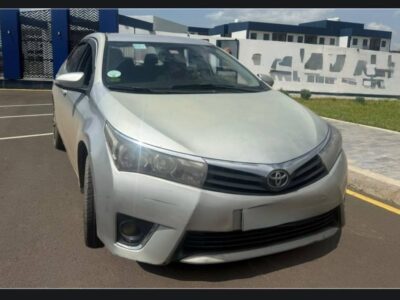 TOYOTA COROLLA (E170).jpg Front bumper and grille of 2016 Toyota Corolla Addis Ababa