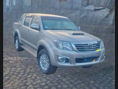1: Front view of silver Toyota Hilux Vigo 2014 double cab pickup truck in Addis Ababa