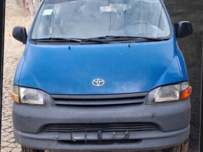 Image 4 (Front Angle View): Front-facing commercial view of blue 2000 Toyota Granvia HiAce XH10 Crew Van