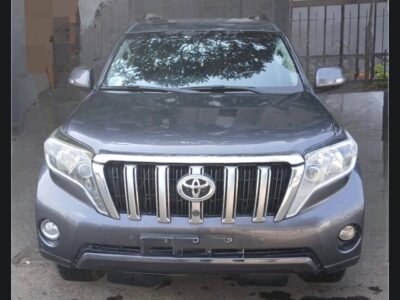 Image 1 (Front View): Front view of Sandy Beach Metallic 2015 Toyota Land Cruiser Prado J150 with chrome grille for sale in Addis Ababa