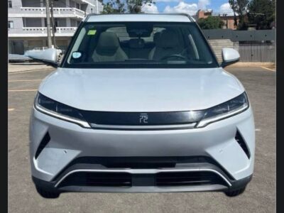1:Front exterior view of 2025 BYD Yuan UP electric SUV in Spirited Gray showing front grill, bumper, and LED headlights