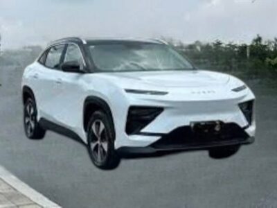 Image 1 (Chery eQ7 (2).jpg): Front view of the white and black 2025 Chery eQ7 electric crossover SUV parked outdoors.