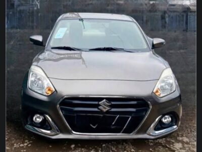 1: Front view of metallic Magma Grey 2021 Suzuki Dzire Ethiopia sedan listed on Megebeya.com