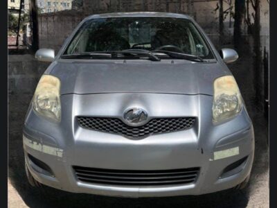 1:Front exterior view of silver 2010 Toyota Vitz XP90 hatchback for sale on Megebeya Ethiopia