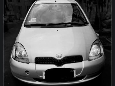 1:Front exterior view of a silver 2001 Toyota Vitz XP10 hatchback for sale in Addis Ababa, Ethiopia