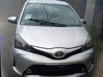 Image 1: Front view of the 2014 Toyota Vitz XP130 showing its spider shape front fascia and integrated black grill in Addis Ababa