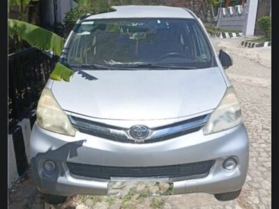 Image 1: Front view of the silver 2013 Toyota Avanza for sale showing the bumper, grille, and headlights in Addis Ababa.