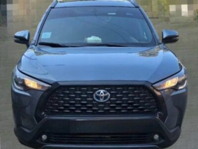 Image 5: Front direct view of the Toyota Corolla Cross Hybrid.